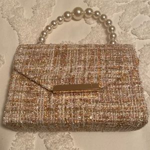 NWT handbag. Neutral colors with a bit of sparkle
